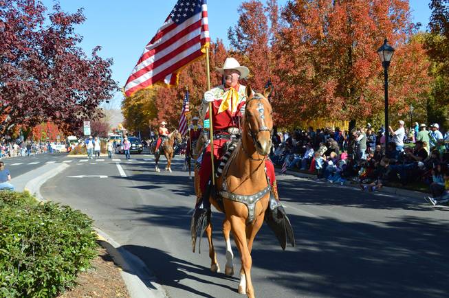 A member of the Merced County (Calif.) Sheriff's Posse rides in the Nevada Day parade in Carson City on Oct. 26, 2013.